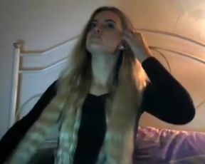 blond beauty masturbates in bed