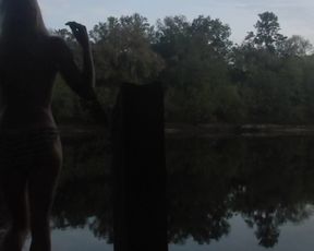 Risky Public Sunset Topless Striptease over Dock on River