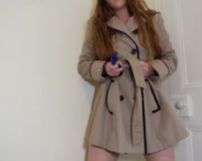 Reddykins toys whilst wearing a long coat